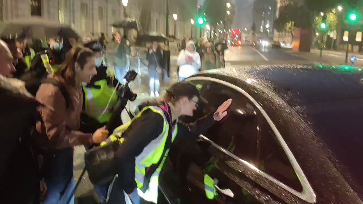 Disclose.tv - NOW - Crowd chants Arrest Bill Gates outside Downing Street in London before a dinner discussing Global Britain with Boris Johnson and others.