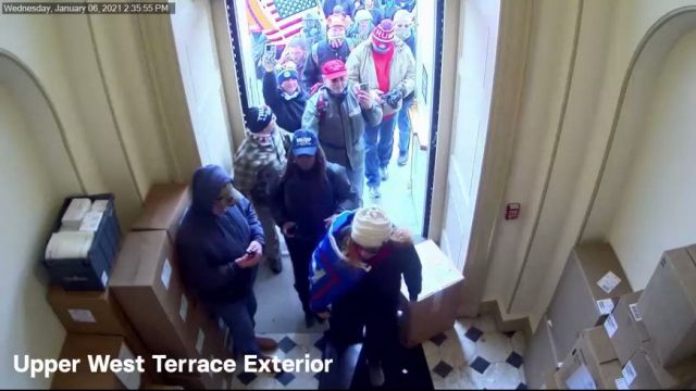 Chris Menahan- Newly released video from inside the Capitol on Jan 6 shows police let peaceful pro-Trump protesters into the building without incident.