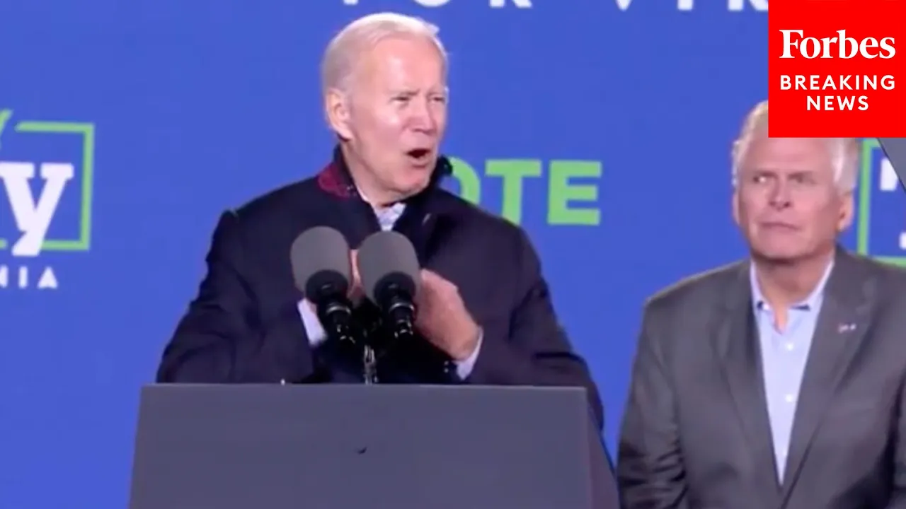 Biden Responds To Protesters During Virginia Rally For McAuliffe